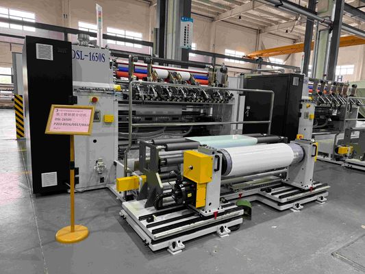 Avvolgitore-riavvolgitore con torretta per taglierina-ribobinatrice